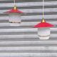 Pair of enamelled sheet metal and glass pendant lights