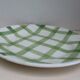 Old round dish Moulin des loups Orchies green tiles