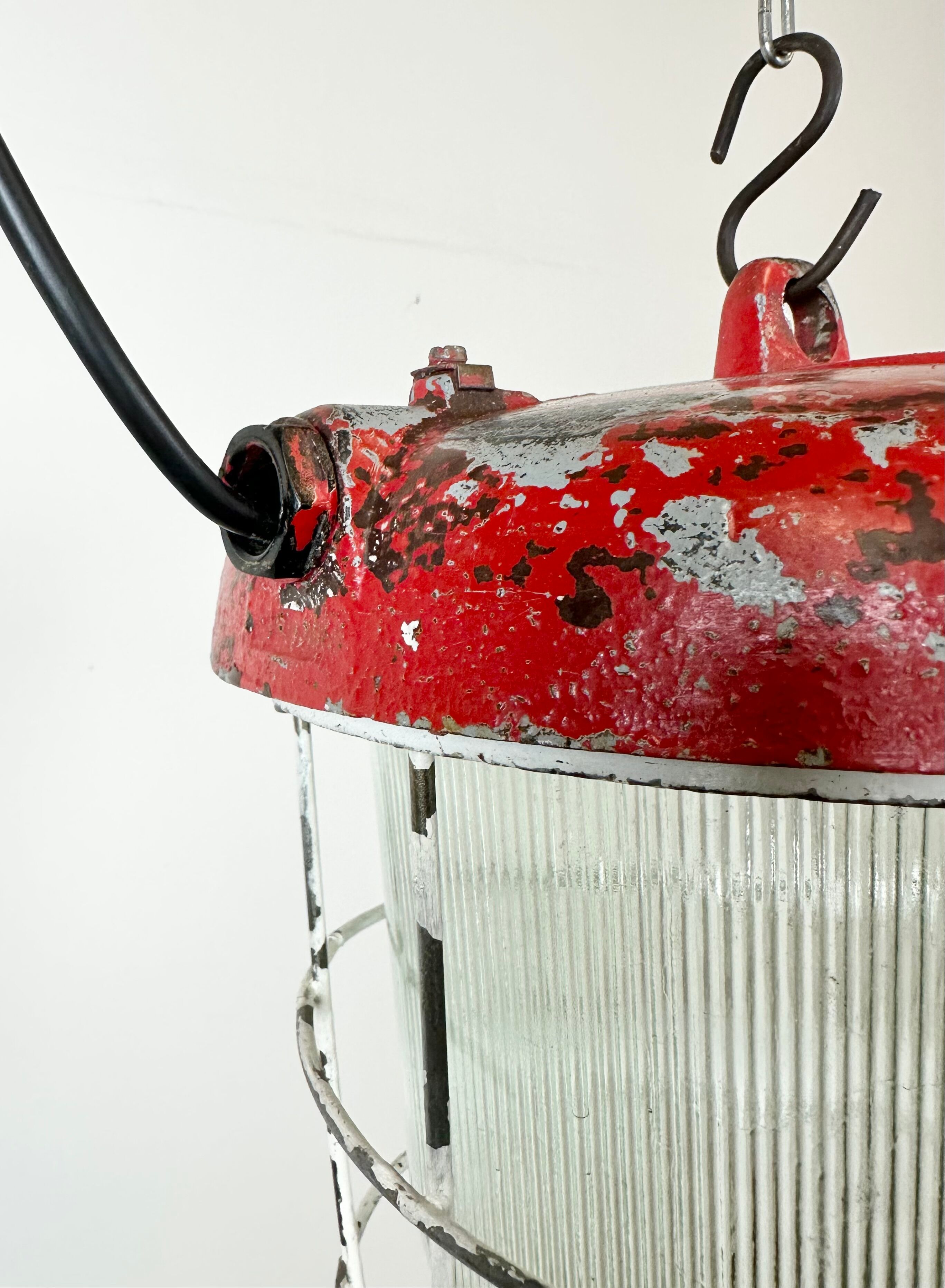 Red industrial cast iron cage pendant light, 1960s