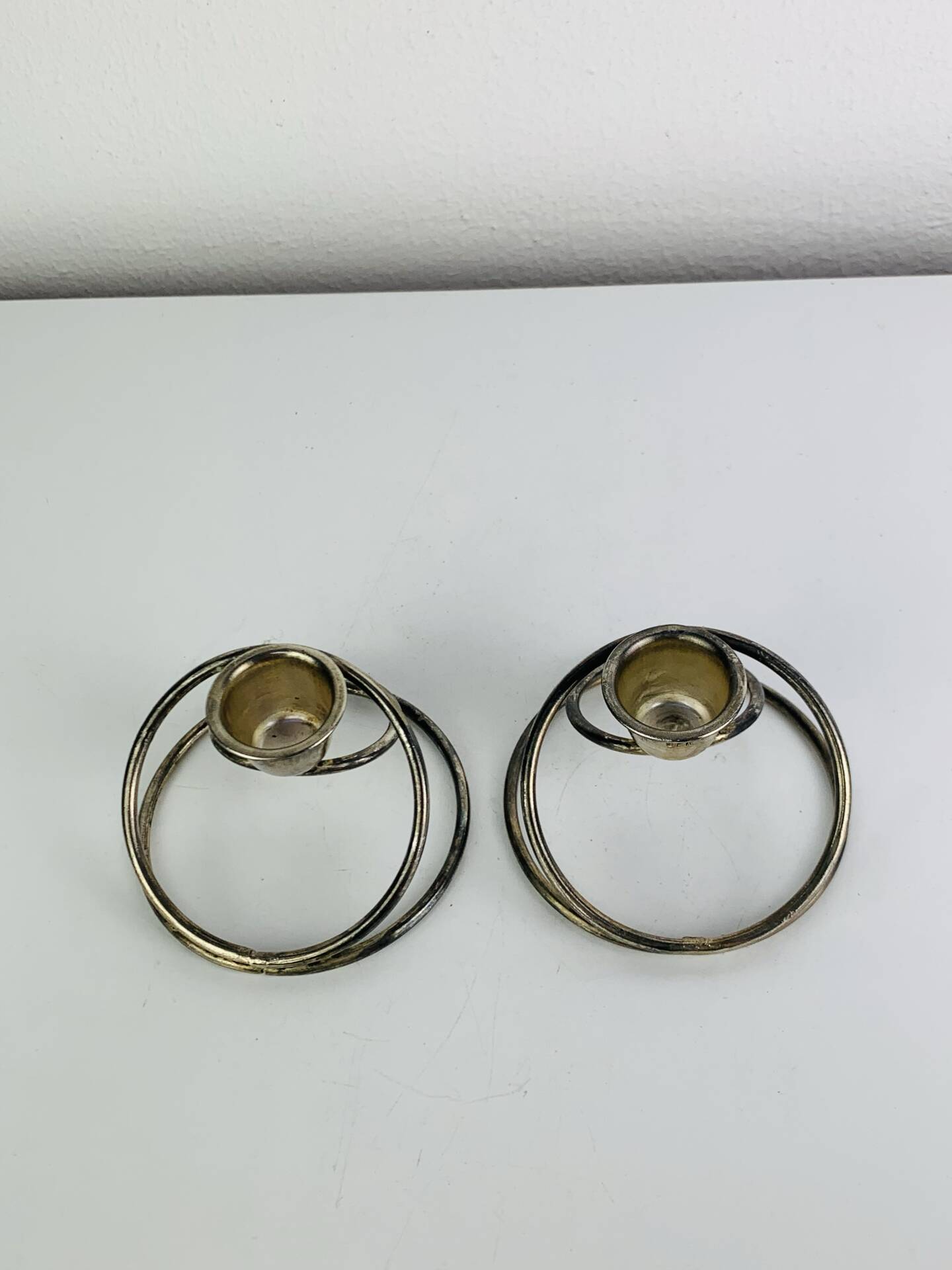 Pair of silver-plated metal candlesticks, vintage
