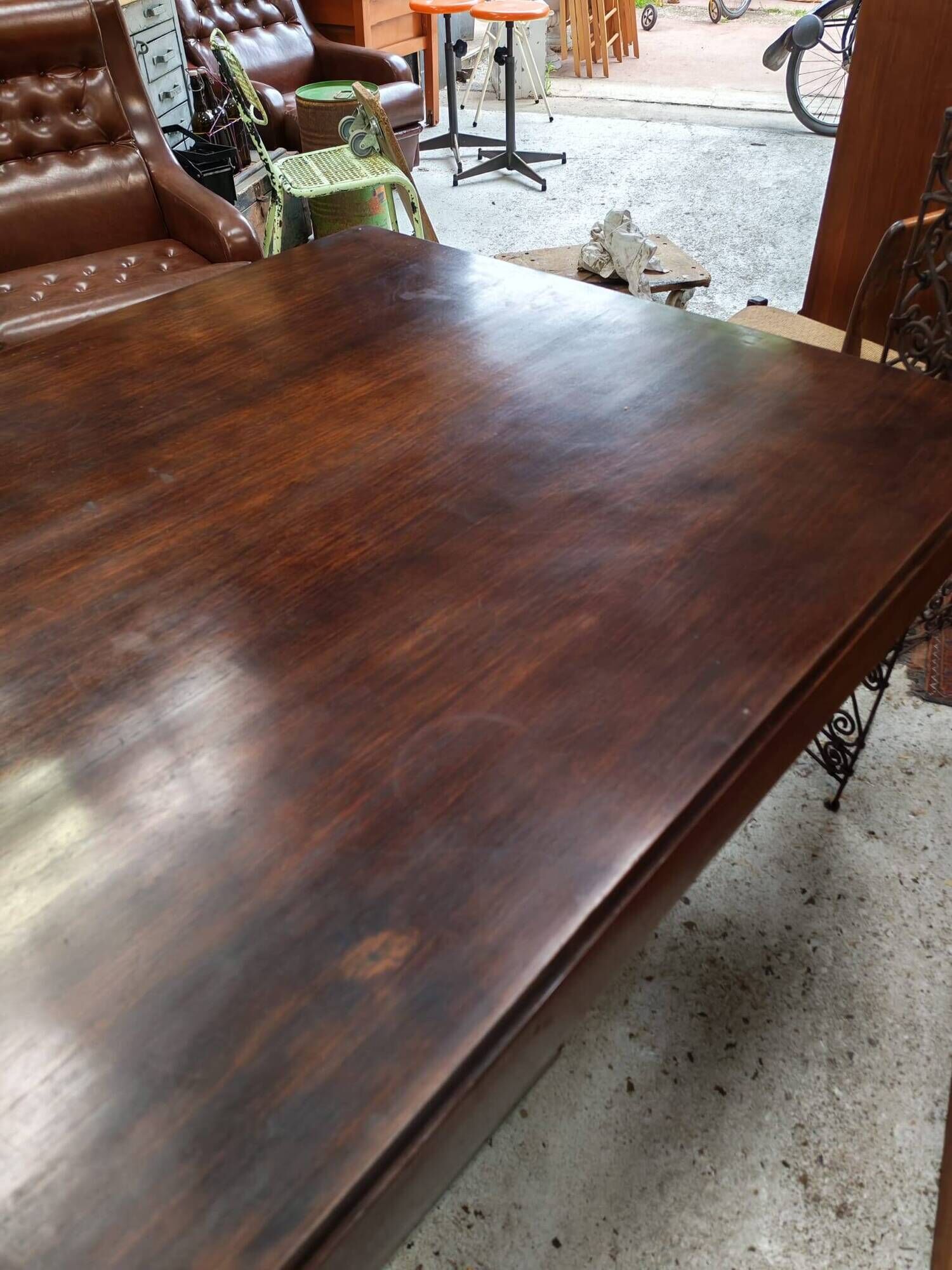 Art Deco dining table with a central cradle base from the 1930s.