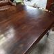 Art Deco dining table with a central cradle base from the 1930s.