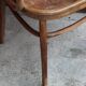 Curved wooden armchair