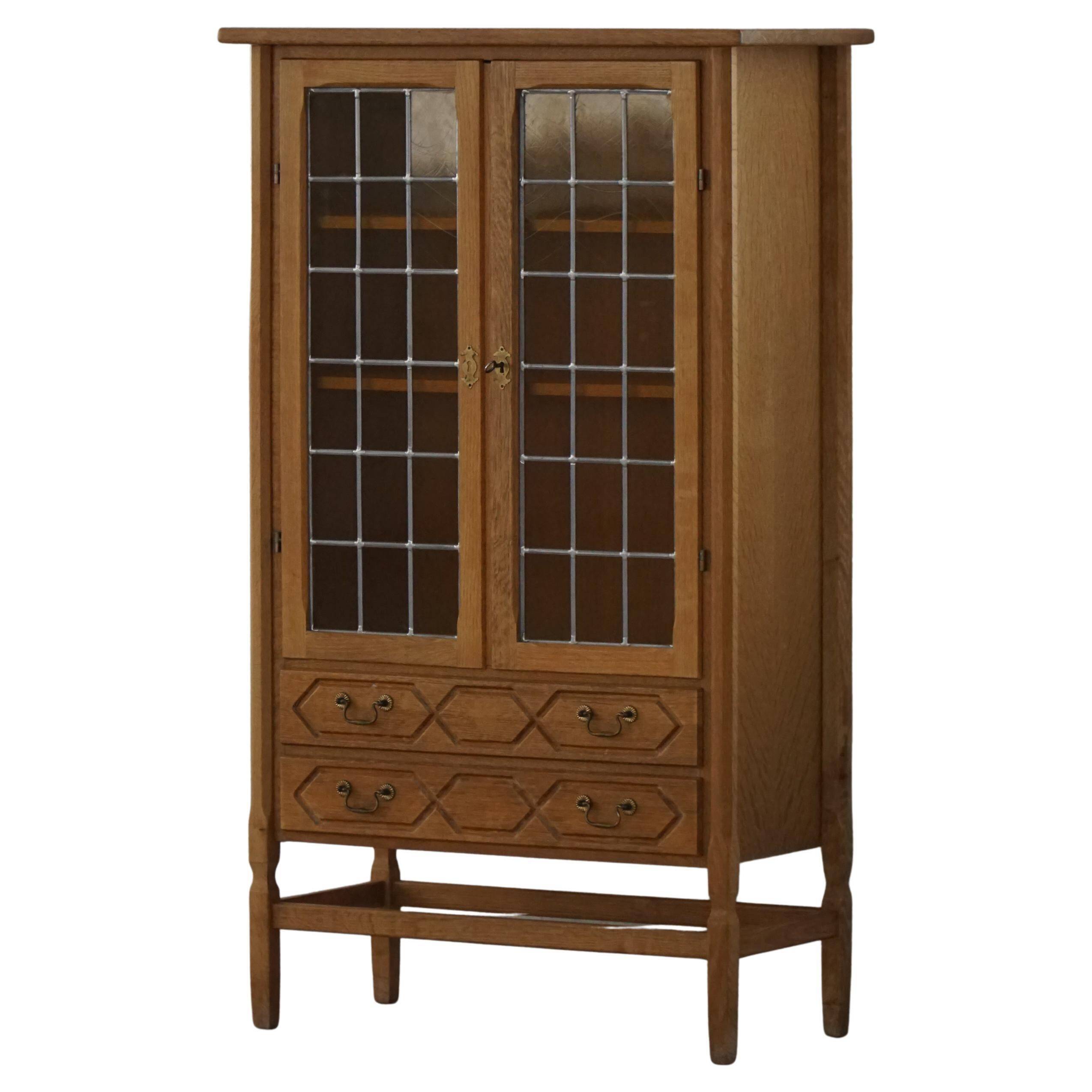 Danish oak display cabinet from the mid-century modern period with leaded glass, 1960s.