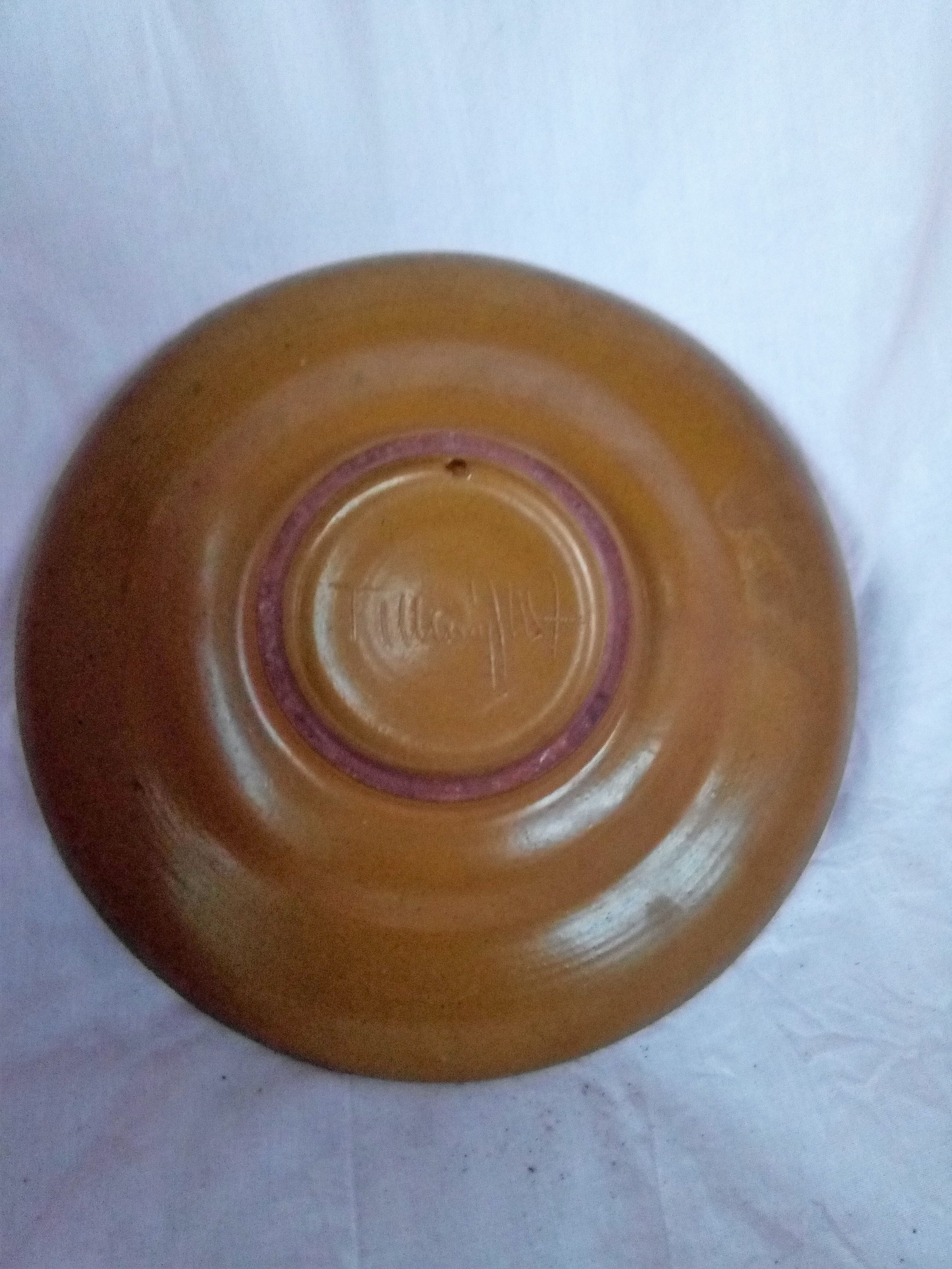 Plate in painted sandstone