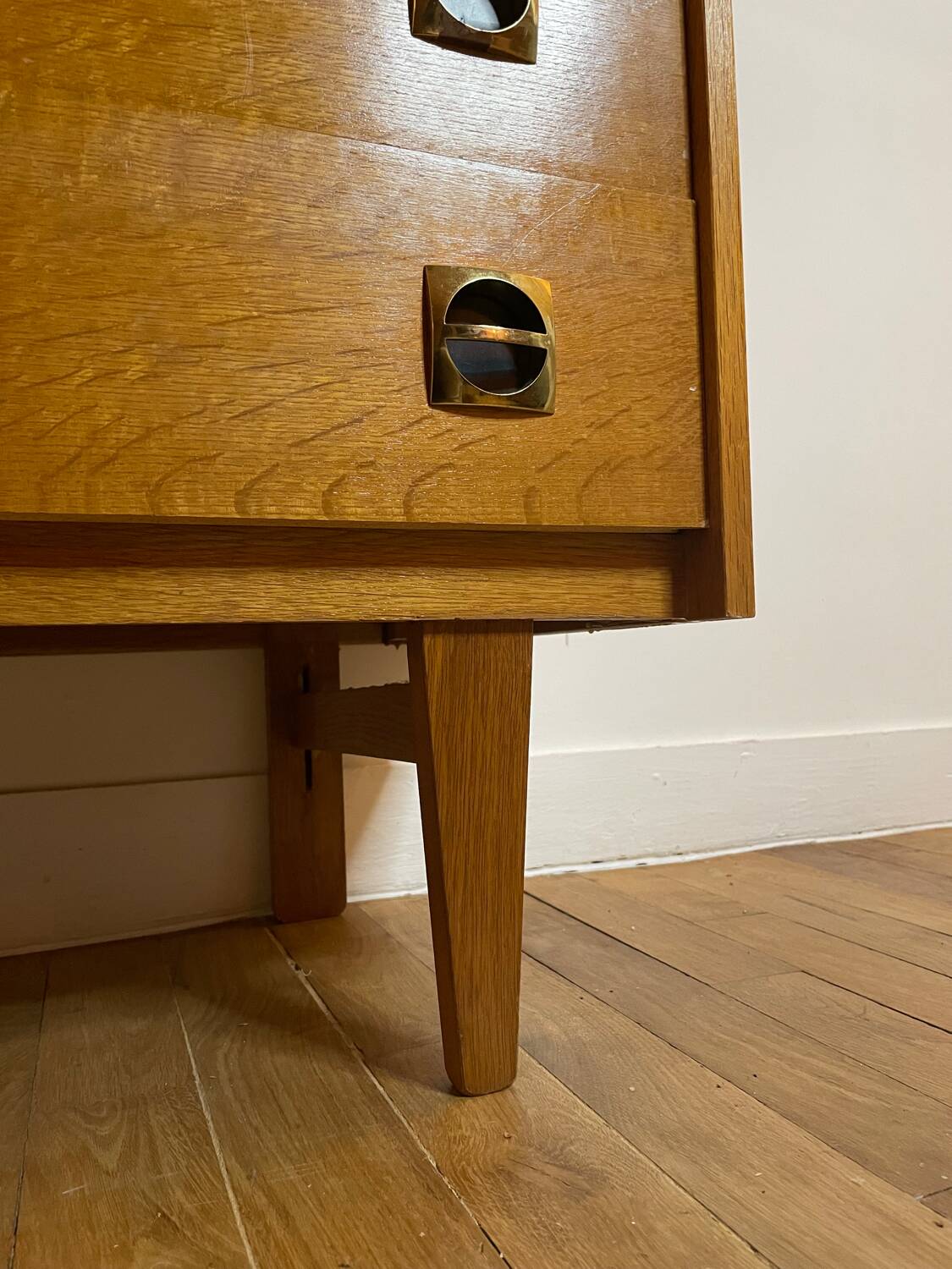 Vintage wooden chest of drawers with compass feet