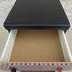 Three-drawer wooden and faux leather chest of drawers on wheels, completely refurbished.