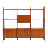Library with wooden uprights by A.V. Contemporary Furnishings, 1960s.