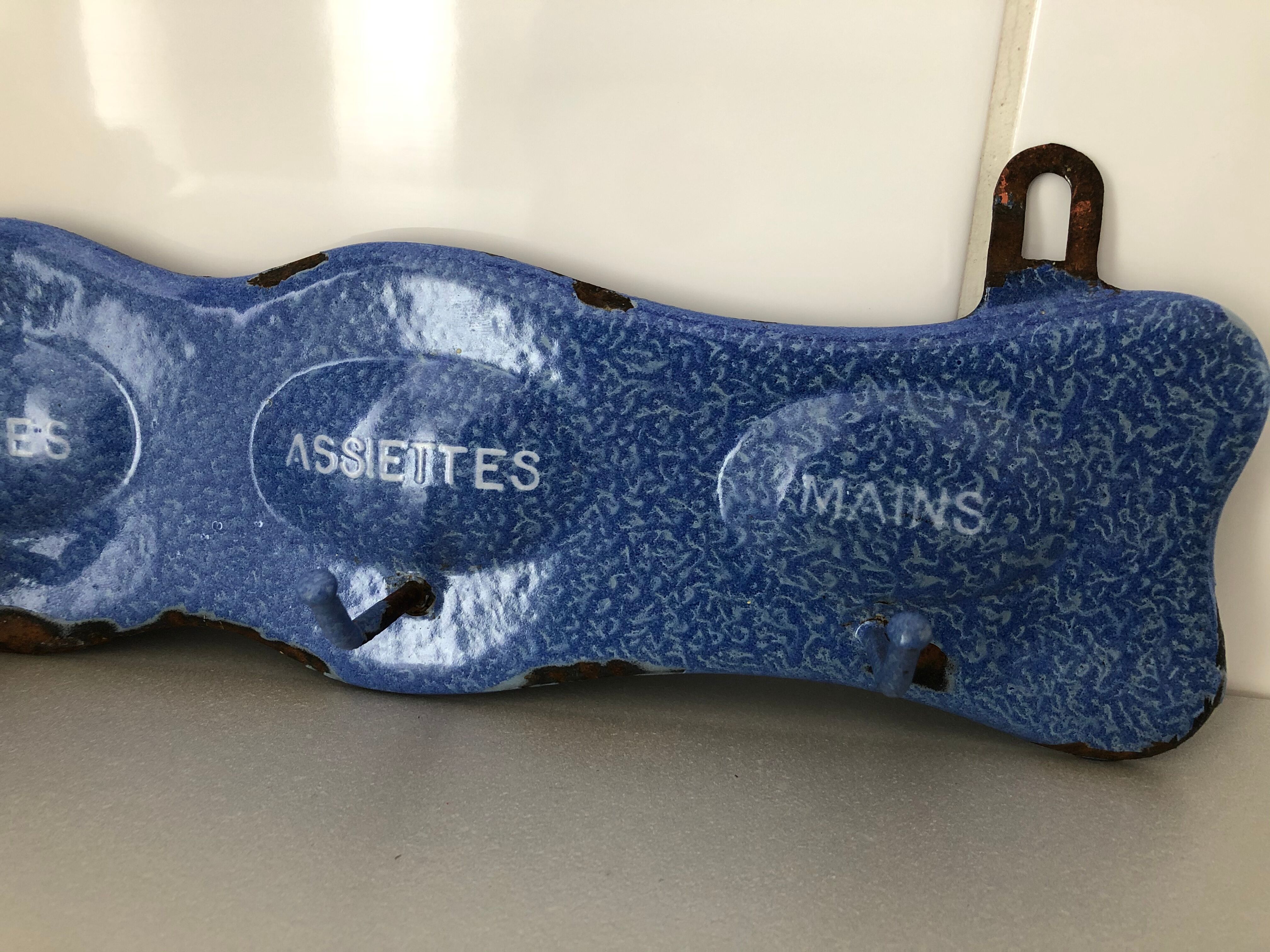 Old enamelled tea towel door