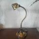 Brass articulated piano or desk lamp