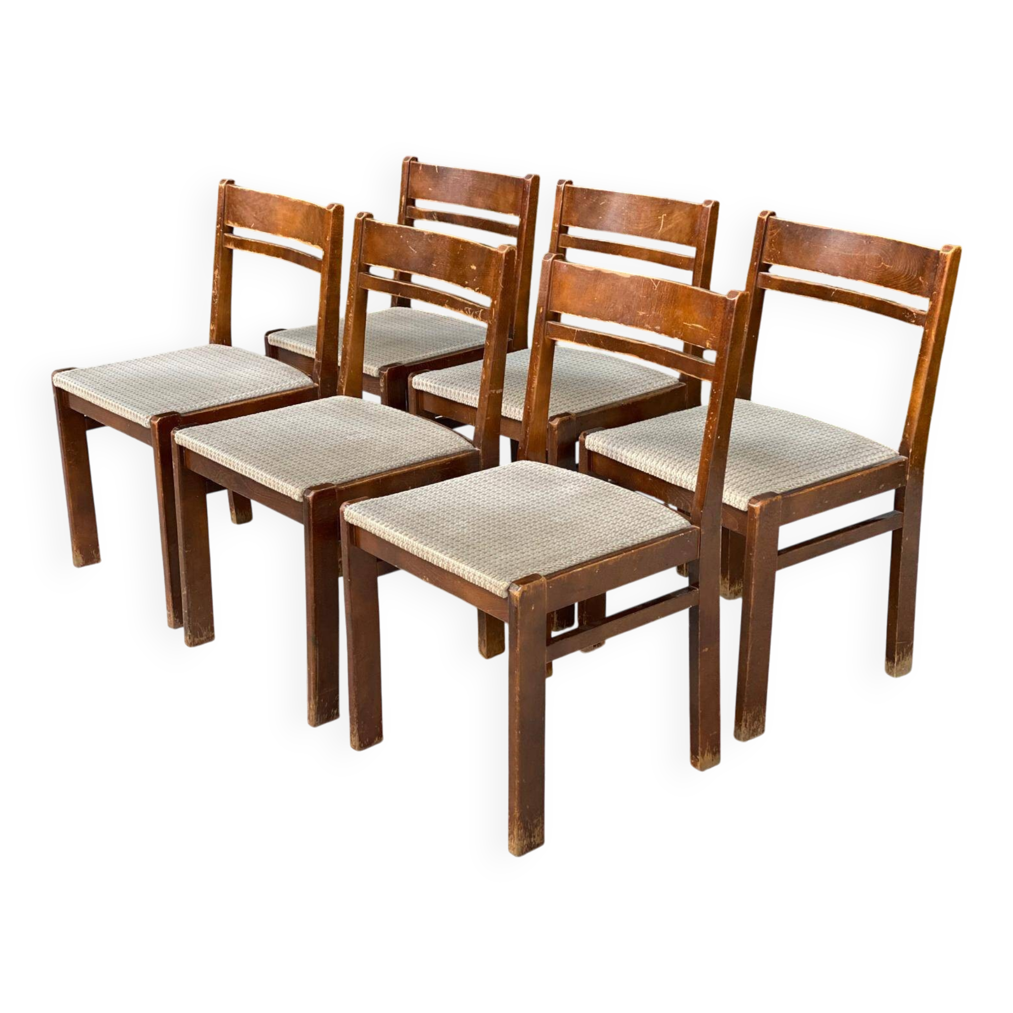 6 Scandinavian Baumann chairs in solid wood and beige fabric.