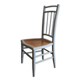 Low chair in wood and canework