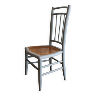 Low chair in wood and canework