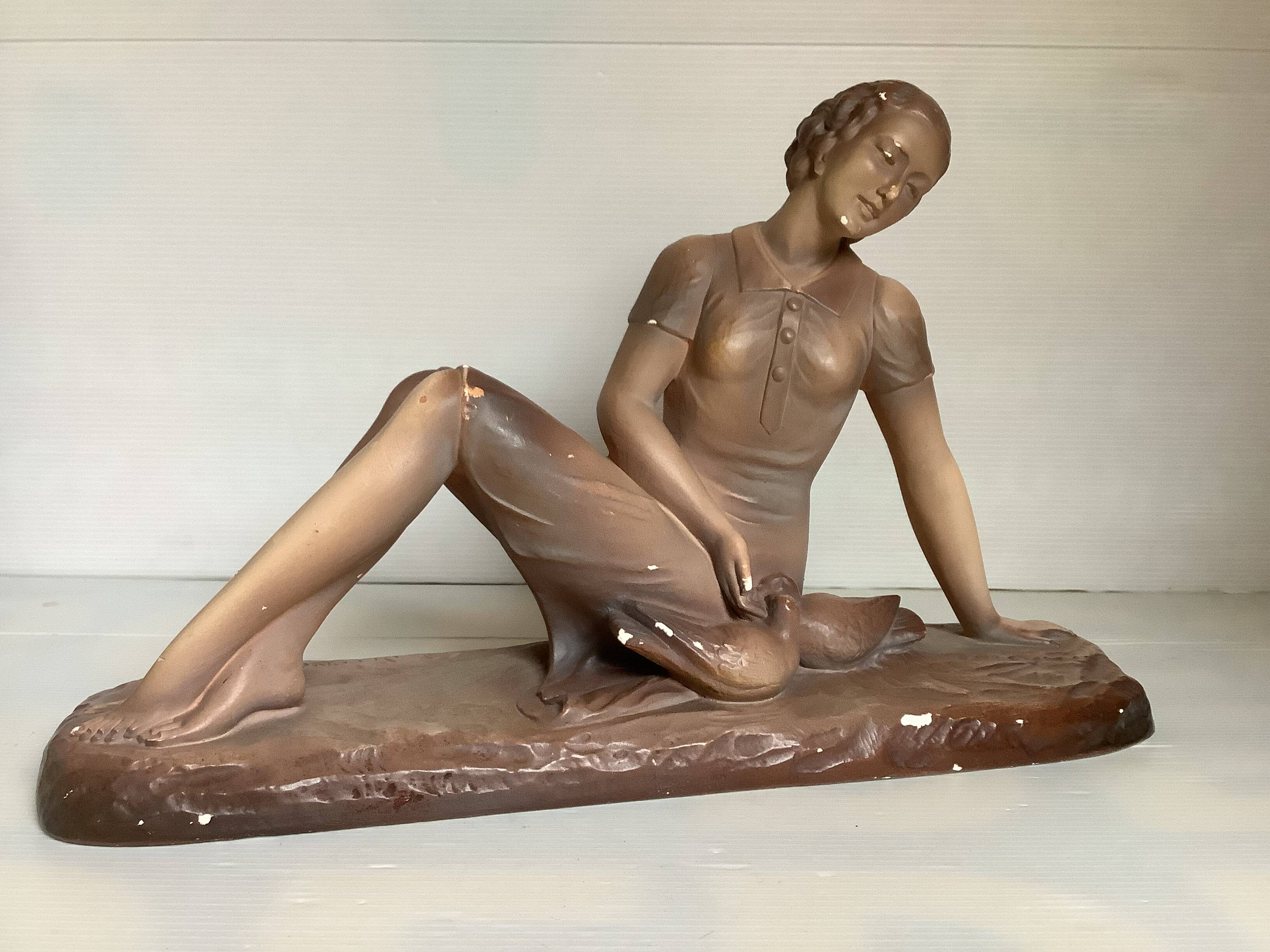 Art Deco statue of the woman with birds