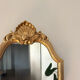 Golden baroque mirror in Louis XV style