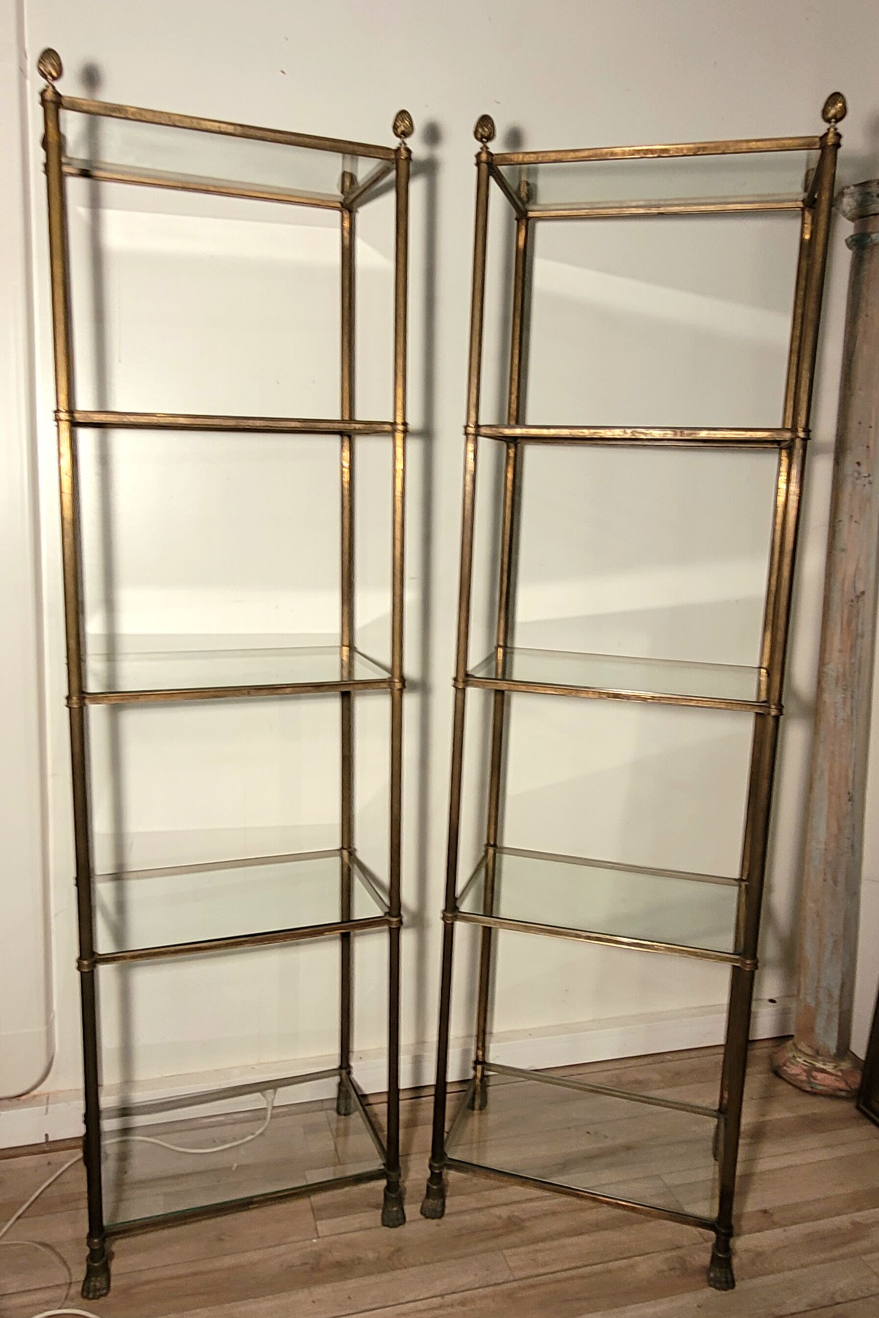 Pair of brass and gilded bronze shelves feet lion's feet