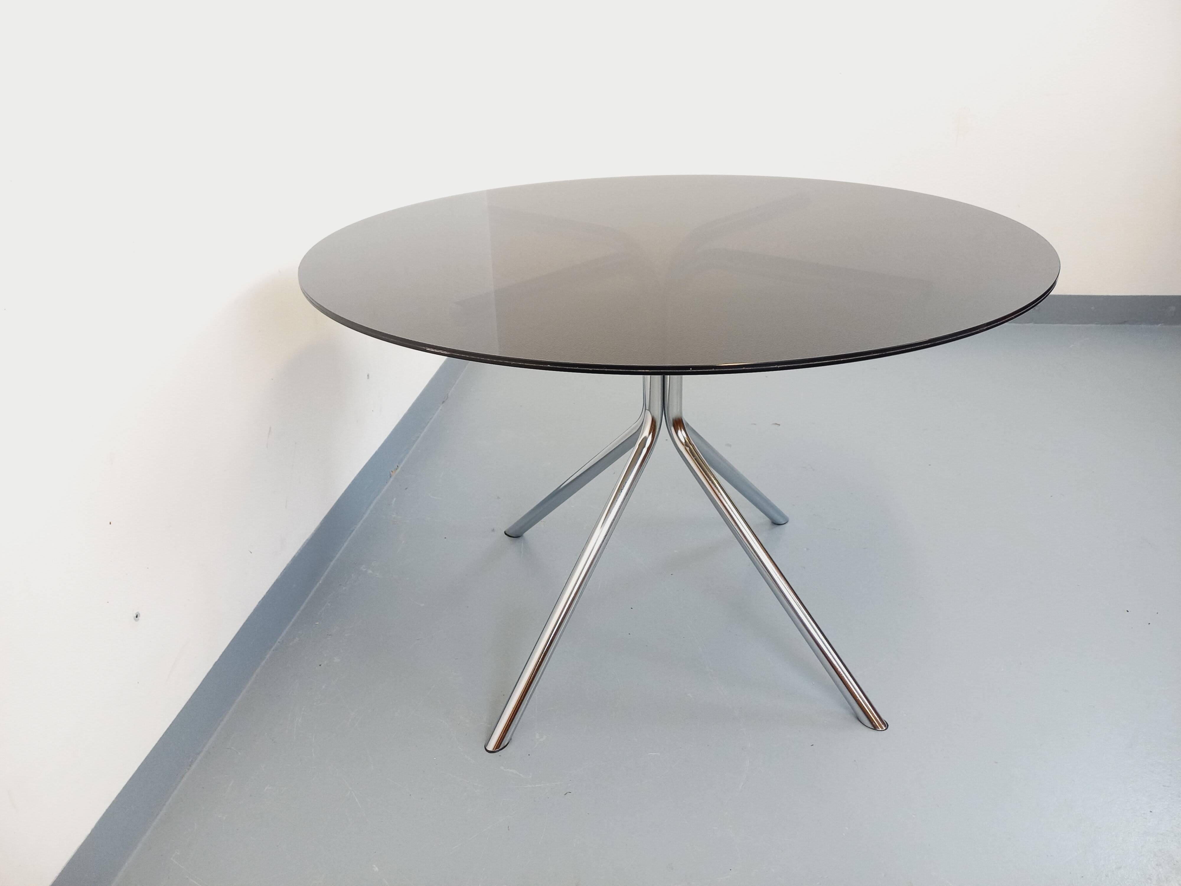 Vintage dining table in smoked glass plexiglass and chrome metal.