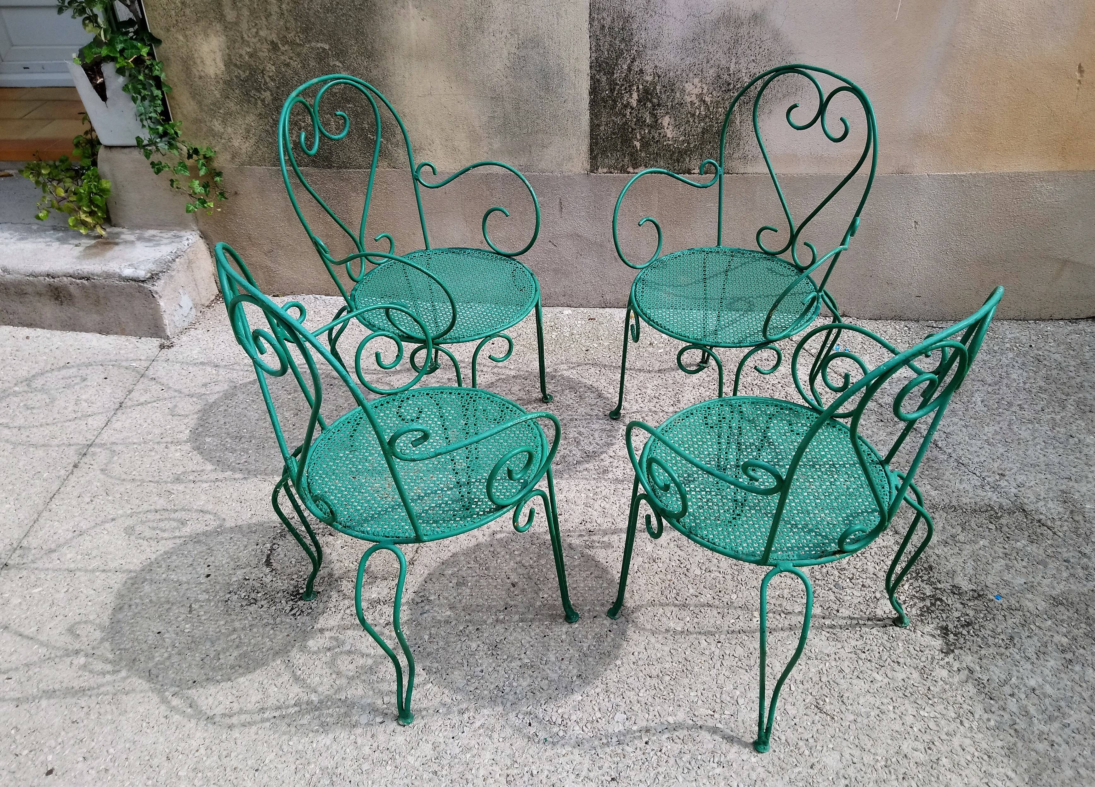 Suite de 4 fauteuils de jardin années 60