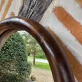 Vintage curved bamboo mirror