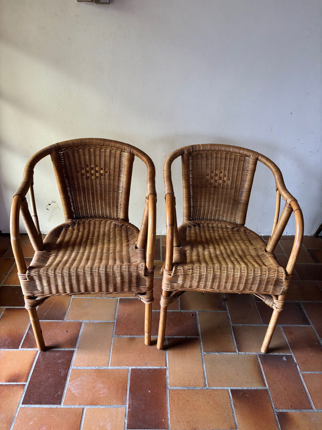 Pair of rattan armchairs, 1980s