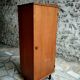 Small vintage Scandinavian shoe cabinet with 1 door.