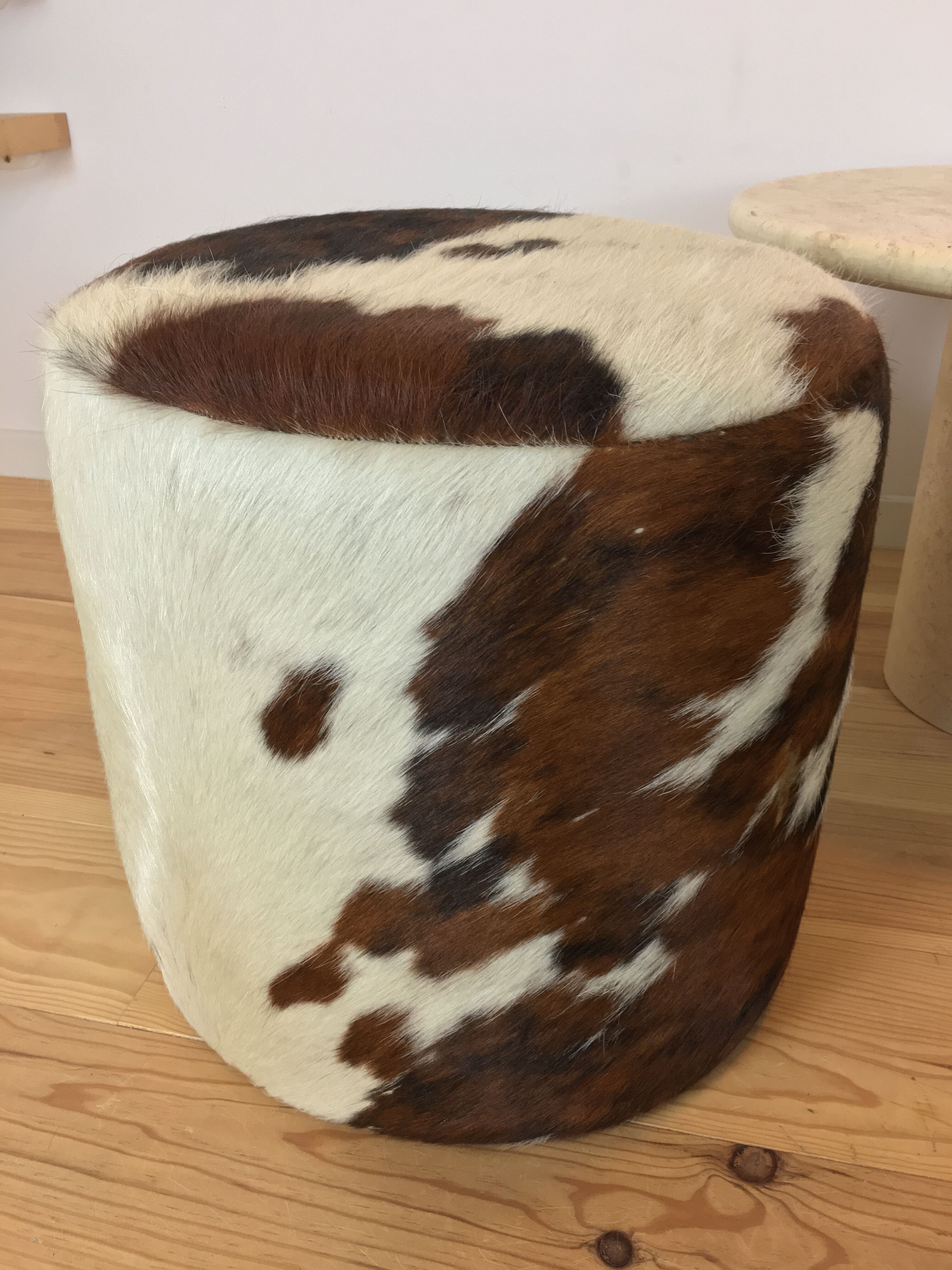 Pouf and cow cushion, leather