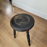 Black wooden tripod stool