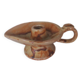 Vintage candle holder in the shape of a stylized Aladdin lamp