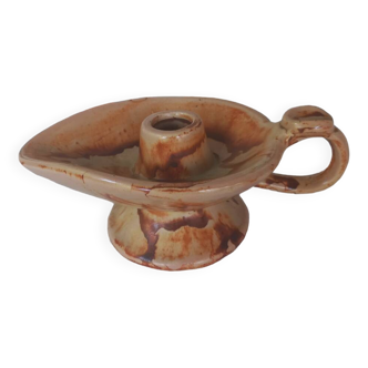 Vintage candle holder in the shape of a stylized Aladdin lamp