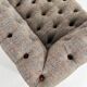 Chesterfield sofa in leather, fabric and wood