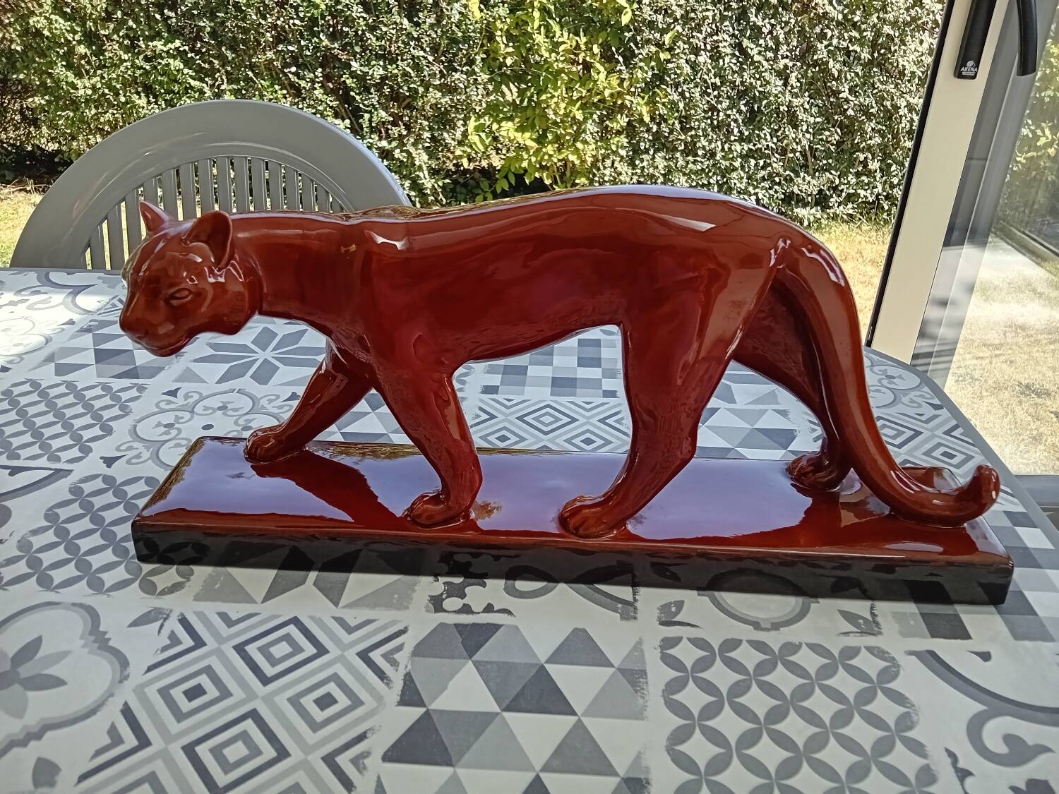 Red enameled panther