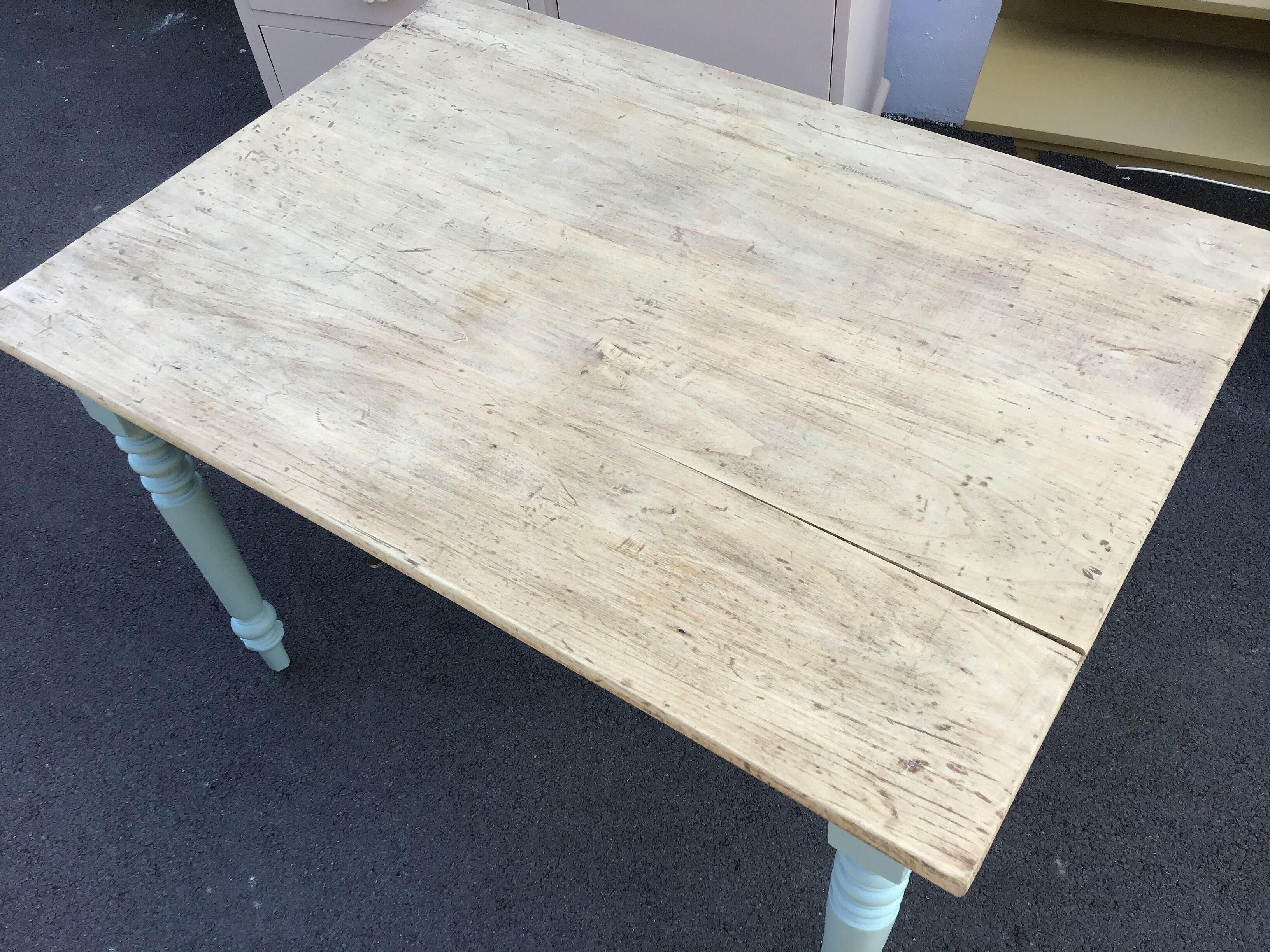 Dining table with painted legs