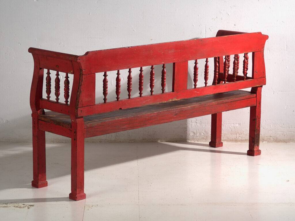 Old red-painted pine bench with turned backrest – Central Europe, circa 1900