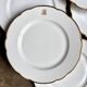 6 scalloped dinner plates in gilded and monogrammed Paris porcelain