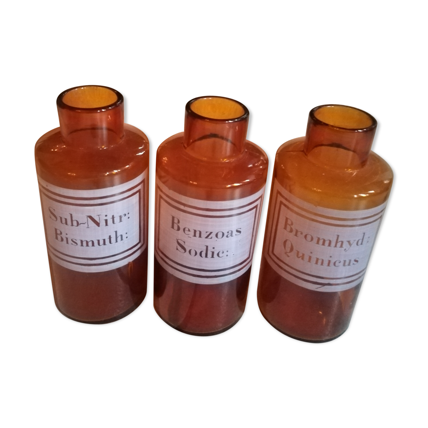 Trio pharmacy bottles