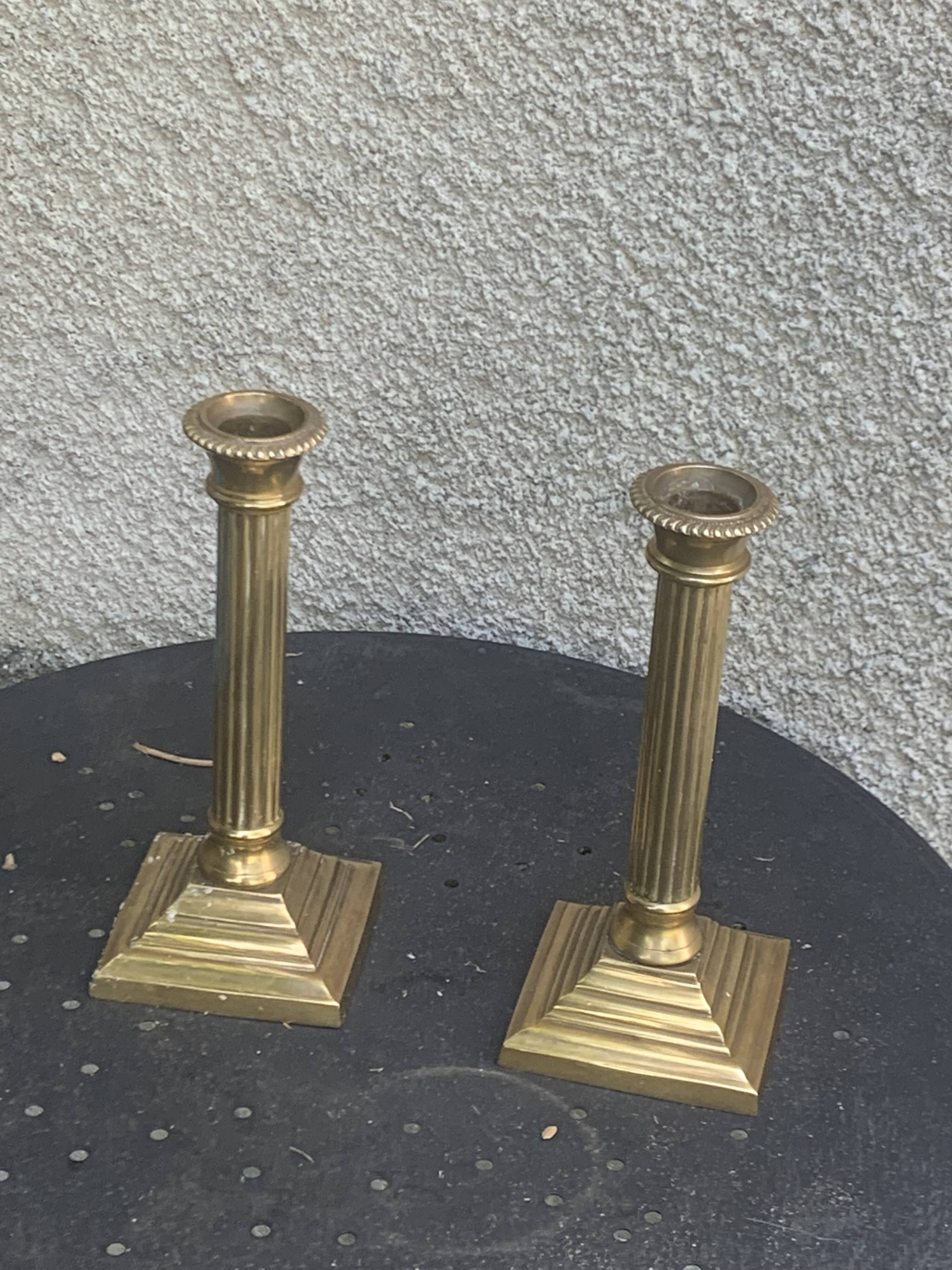 Pair of gilded brass candlesticks, vintage column shape