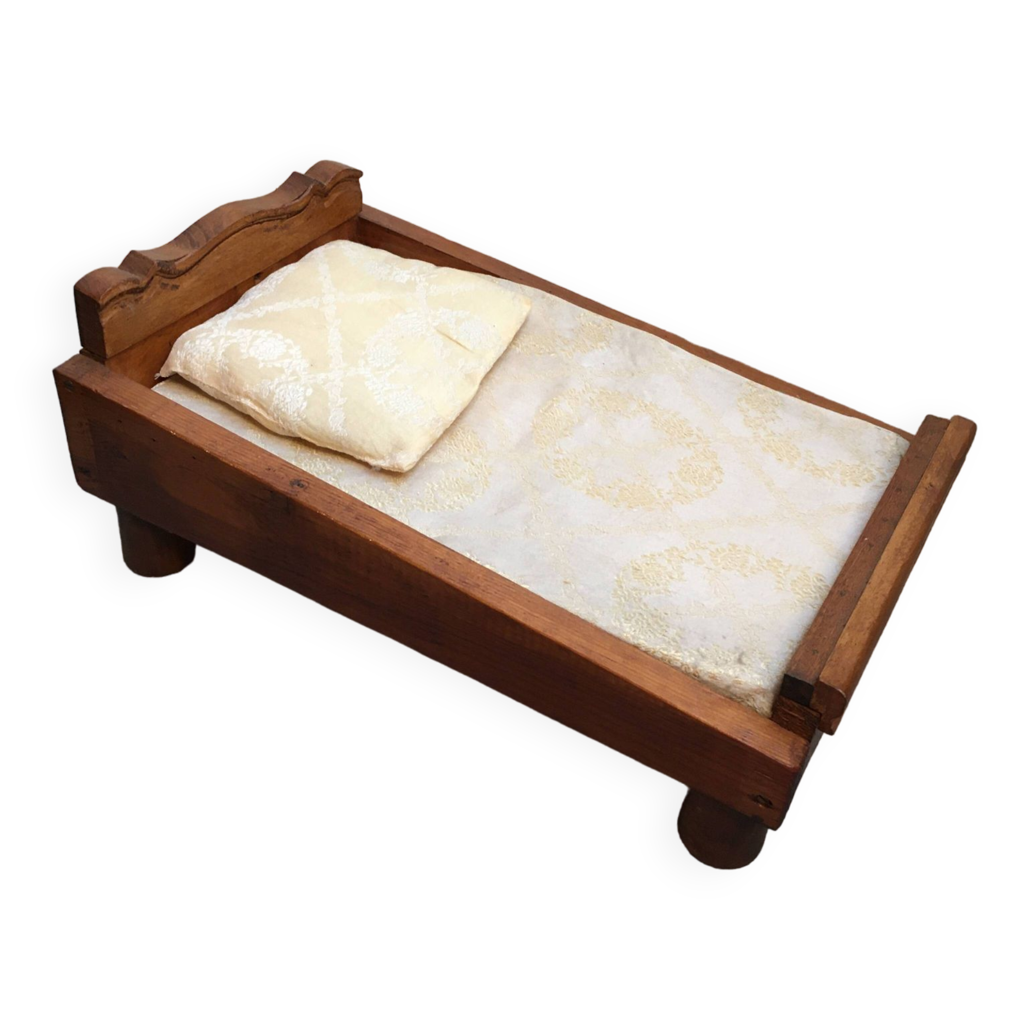 Old wooden bed for doll with mattress and pillow