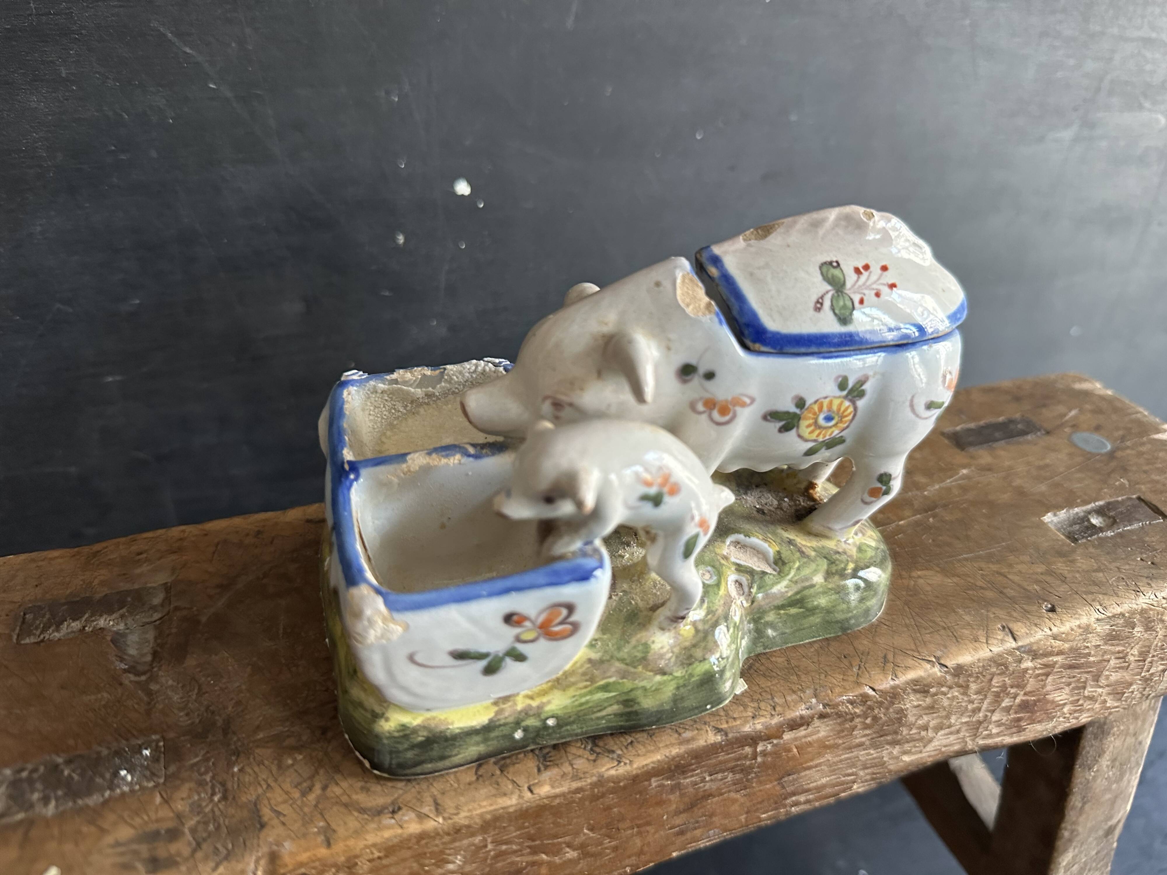 Antique earthenware pig box, salt cellar or mustard pot, floral decoration.