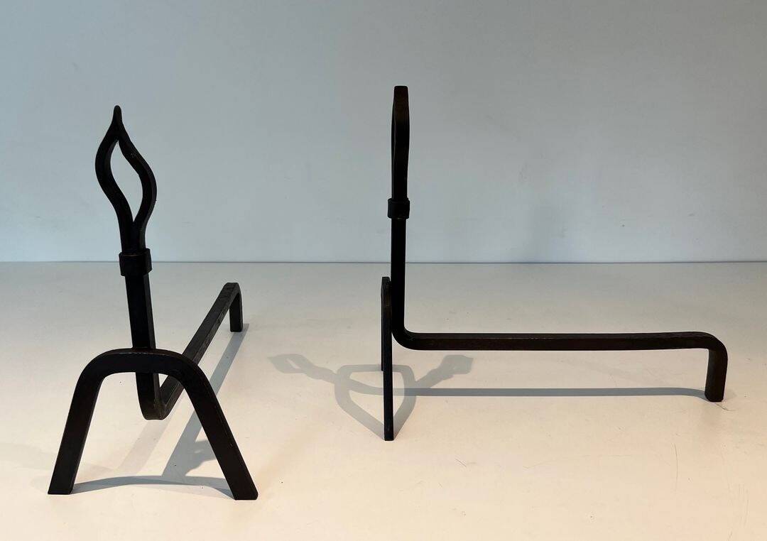 Pair of Modernist Andirons in Wrought Iron with Stylised Torches and Bases Ang