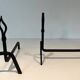 Pair of Modernist Andirons in Wrought Iron with Stylised Torches and Bases Ang