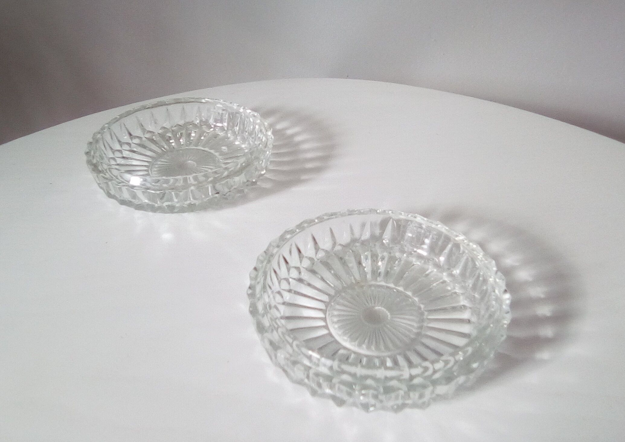 Pair of vintage crystal moulded ashtrays