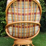 Swivel rattan armchair with matching ottoman