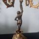Pair of gilded bronze candlesticks with nude women