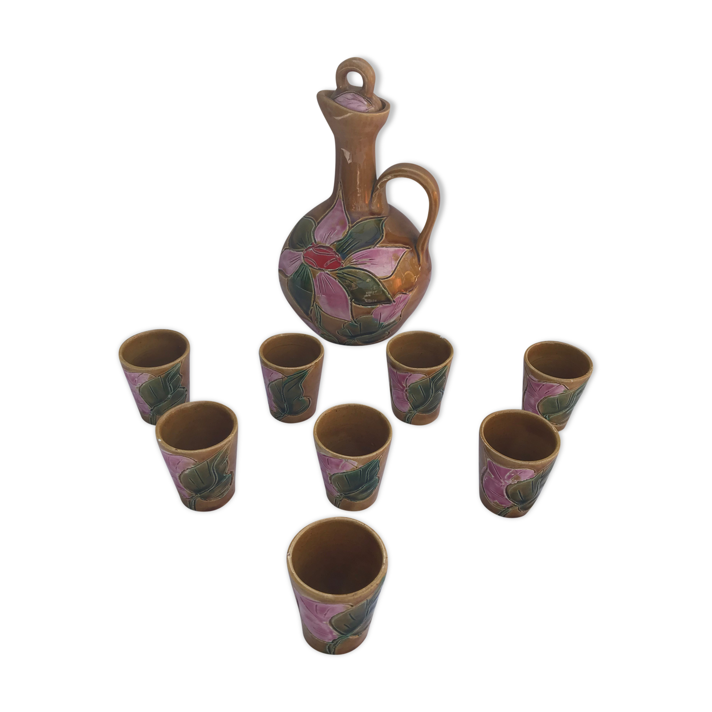 Old carafe with 8 ceramic glasses