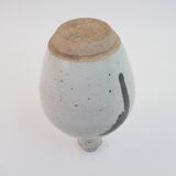 Stoneware bottle with abstract plant motif signed Herbes Folles