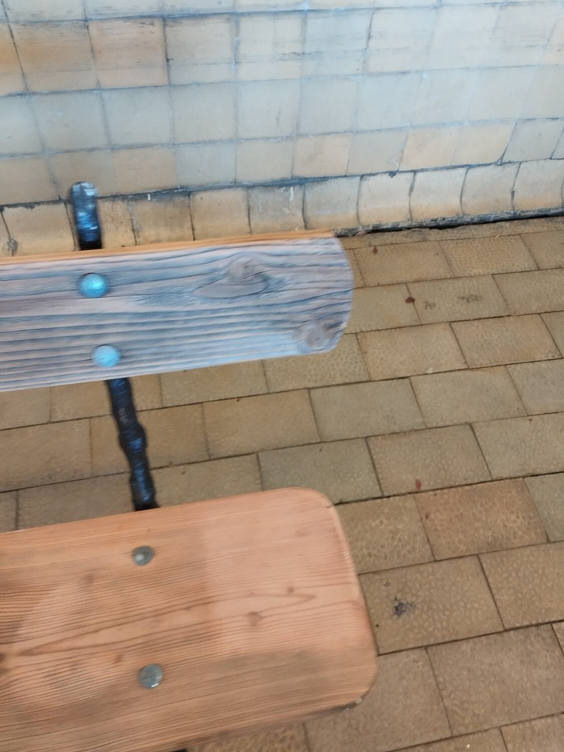 Antique garden bench with cast iron legs