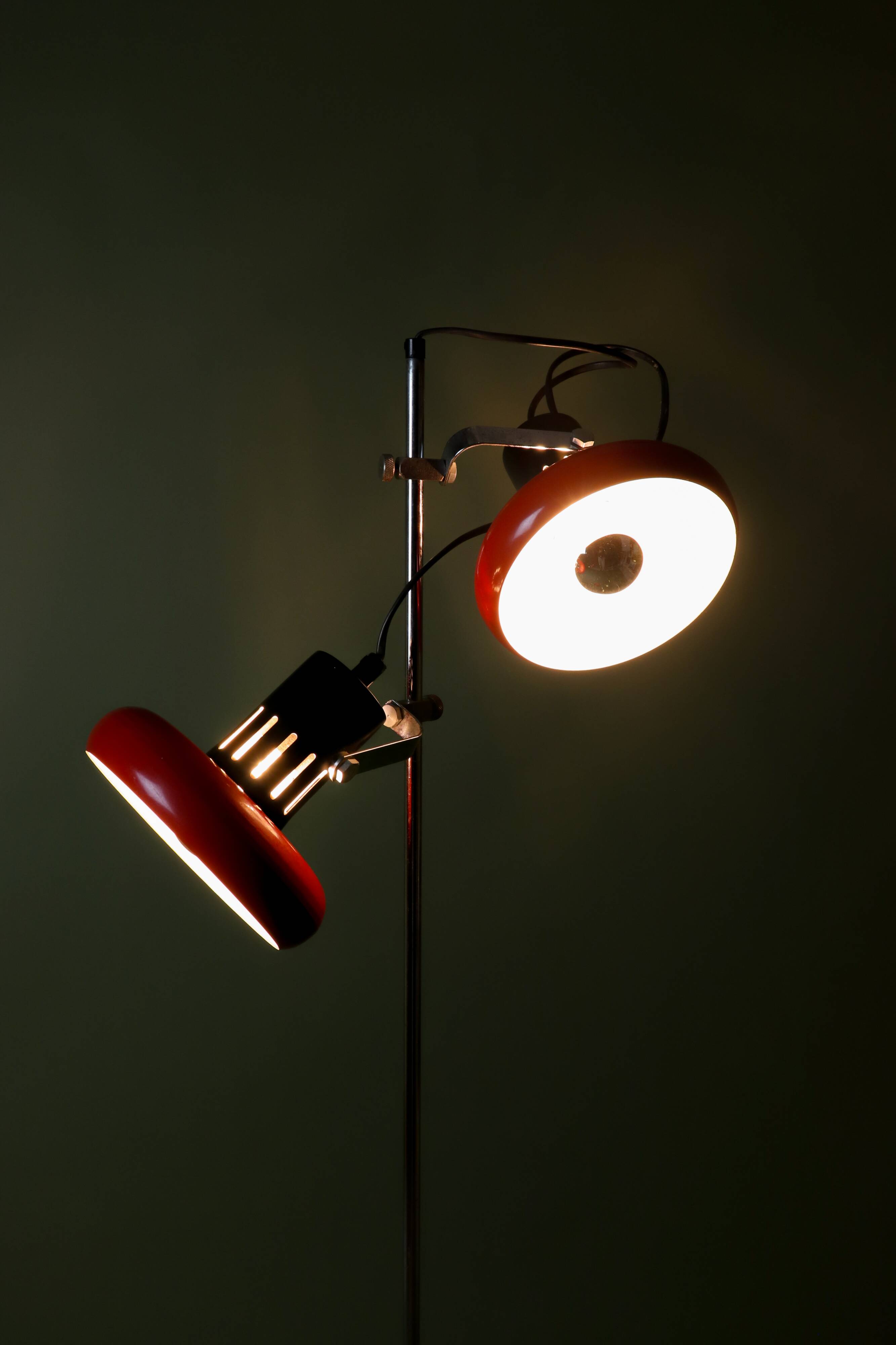 Red and black Aluminor floor lamp with two lights from the 1960s.
