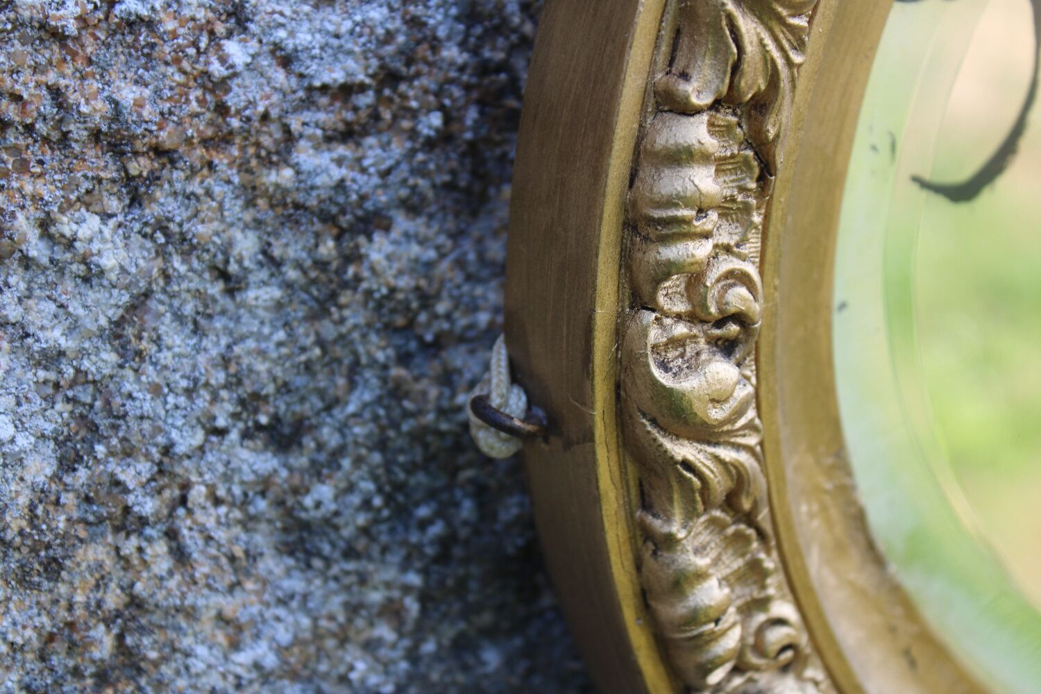 Bevelled oval antique mirror