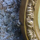 Bevelled oval antique mirror