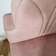 Single bar stool in pink stitched faux leather.